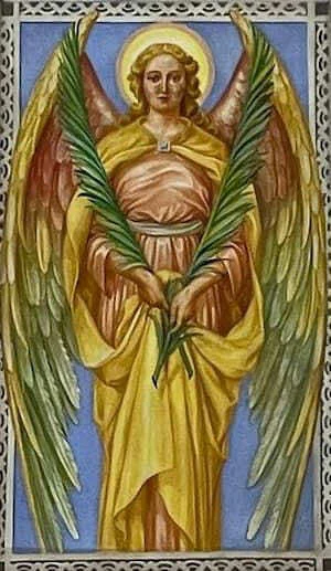 Ángel que lleva hojas de palma